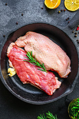 duck breast raw fillet meat, grilled meat.
Menu food background keto or paleo diet. top view. copy space for text