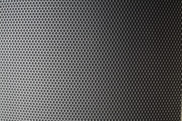Sound speaker mesh texture composed of hexagons for background