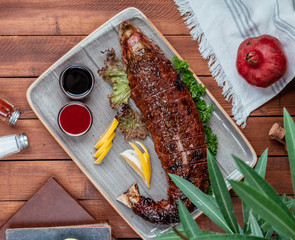 fried fish with lemon slices on the table