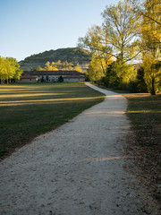 Autumnal view over the Olarizu Park, Olarizu Meadows, the Casa de la Dehesa Building and peak Olarizu. Vitoria-Gasteiz, Basque Country, Spain