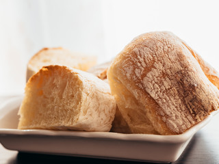 Sliced homemade bread in flour.
