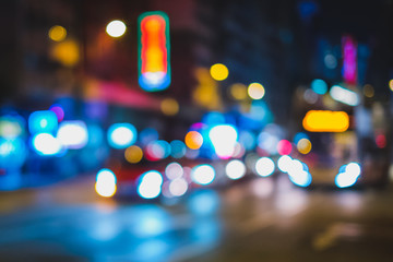 Bokeh lights of city traffic at night, blur image of cars on street