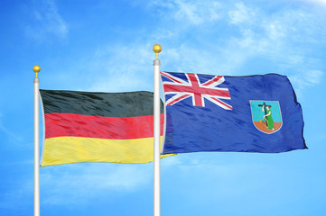 Germany and Montserrat two flags on flagpoles and blue cloudy sky