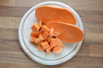 sweet potatoe on a chopping board