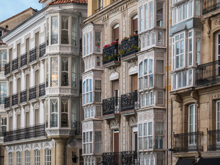 Fototapeta premium Facade of old city apartment buildings on the Virgen Blanca Square in the Old Town of Vitoria-Gasteiz, Basque Country, Spain