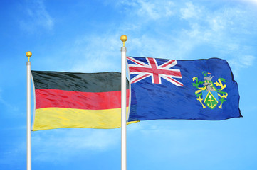 Germany and Pitcairn Islands two flags on flagpoles and blue cloudy sky