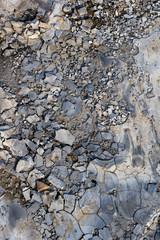 Top view of cracked black dry ground, natural background.