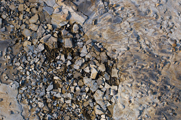 Top view of cracked black dry ground, natural background.