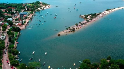Drone shot of multiple boats in the harbor at Alter do Chao along the Tapajos River in the Amazon state of Para, Brazil.