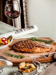 fried steak with sauce and red wine _