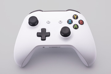 white video game controller on a white background