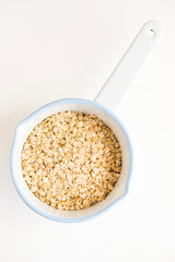 Rolled Oats in White Enamel Pot