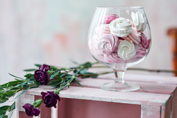 Sweet cakes in a glass vase.. Gift in a beautiful package