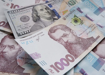 Banknote of 100 American dollars and 1000 Ukrainian hryvnias. Franklin and Vernadsky confrontation. The ratio of the hryvnia to the dollar. Exchange Rates.