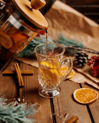glass of tea with lemon on the table