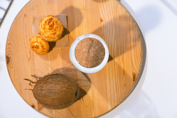 Confectionery - still life. Cookies, bakery products, tangerines, eggs. Cooking dessert and sweets. Sugar and cafe. Coffee or tea to buns. Still life with food