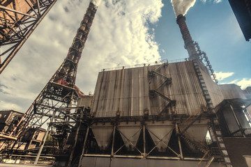 General view of the sinter plant. Submission of iron ore for sintering before entering the blast furnace. Metallurgical production. Day panorama