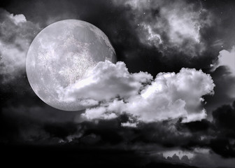 Naklejka na ściany i meble Full moon with clouds clearing
