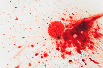 Splashes of blood dripping into the sink in the bathroom. red virus molecules
