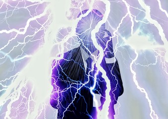 光を浴びて瞑想するビジネスマン