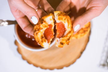 Confectionery - still life. Cookies, bakery products, tangerines, eggs. Cooking dessert and sweets. Sugar and cafe. Coffee or tea to buns. Still life with food