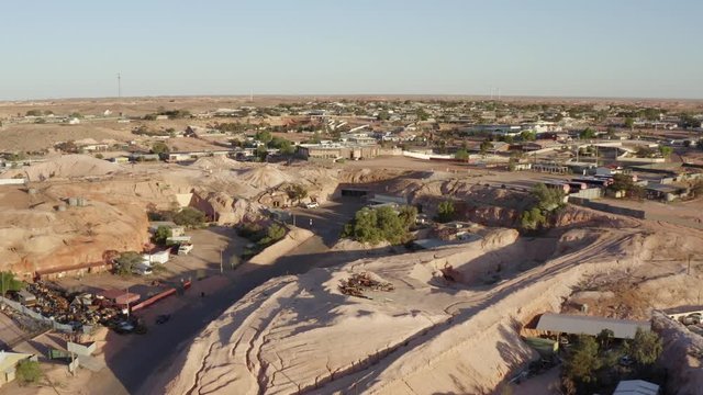 Surreal Aerial of Outback Australian Opal Town of Coober Pedy. Against harsh backdrop of desert landscape.