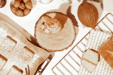 Confectionery - still life. Cookies, bakery products, tangerines, eggs. Cooking dessert and sweets. Sugar and cafe. Coffee or tea to buns. Still life with food