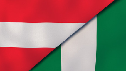 Fototapeta premium The flags of Austria and Nigeria. News, reportage, business background. 3d illustration