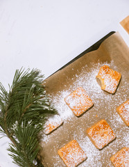 Confectionery - still life. Cookies, bakery products, tangerines, eggs. Cooking dessert and sweets. Sugar and cafe. Coffee or tea to buns. Still life with food