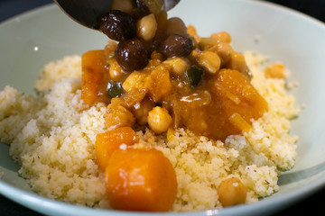 Home-made vegan Cuscús being served