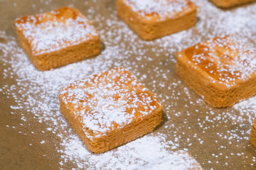 Confectionery - still life. Cookies, bakery products, tangerines, eggs. Cooking dessert and sweets. Sugar and cafe. Coffee or tea to buns. Still life with food