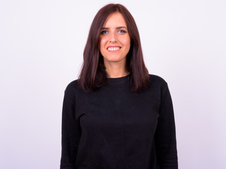 Obraz premium Portrait of happy young beautiful woman smiling