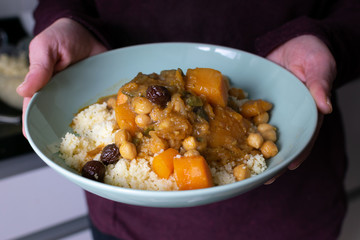 Home-made vegan Cuscús being served