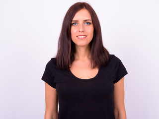 Fototapeta premium Portrait of happy young beautiful woman smiling