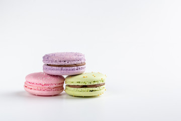 colorful macaroons on white background