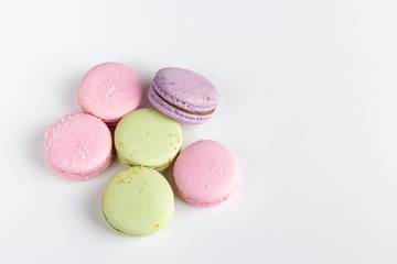 colorful macaroons on white background