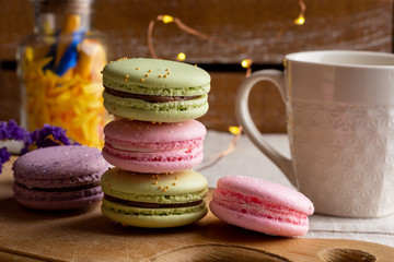 colorful macaroons on a wooden table