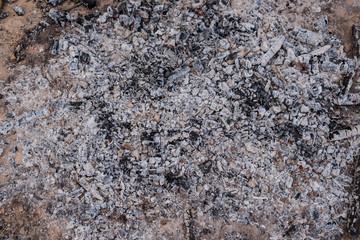 Burnt fire embers. Ashes. Copy space.