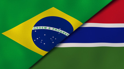 The flags of Brazil and Gambia. News, reportage, business background. 3d illustration