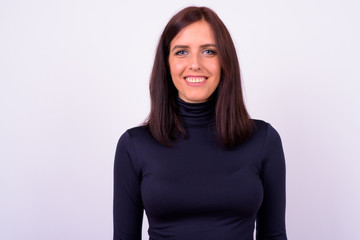 Obraz premium Portrait of happy young beautiful businesswoman smiling