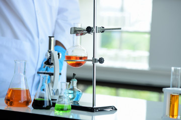 Scientists are working on scientific tests in the lab. Science force Perform chemical testing and analysis or Experimental production of drugs and vaccines