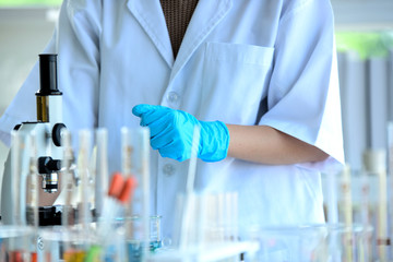 Fototapeta premium Scientist laboratory test tube in future tone,Scientific research,Scientific tools at laboratory