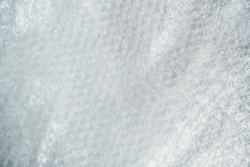 Obraz premium Setting of the delivery box for the customer, online sales, plastic bubbles on wooden table. Online shopping concepts.