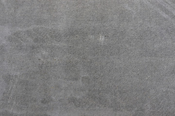 Cement gray background, texture with scratches.