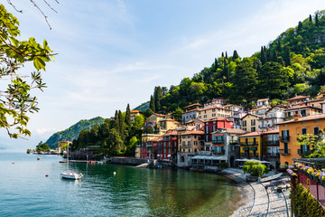 Fototapeta na wymiar The view of Lake Como from the waterfront of the town of Varenna