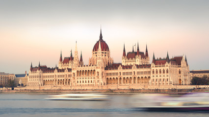 Fototapeta na wymiar Hungarian Parliament building and blurred boats