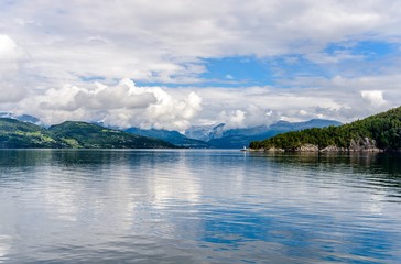 Idyllic view on Hardangerfjord by Jondal, Norway.