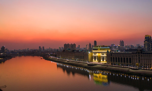 Fototapeta Phnompenh capital of Cambodia on the sunset with beautiful landscape by drone