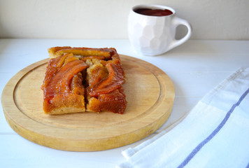 Caramel banana pie on a white background