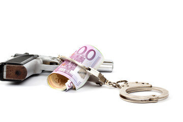 Money and handcuffs. Concept for corruption, fraud, money laundry